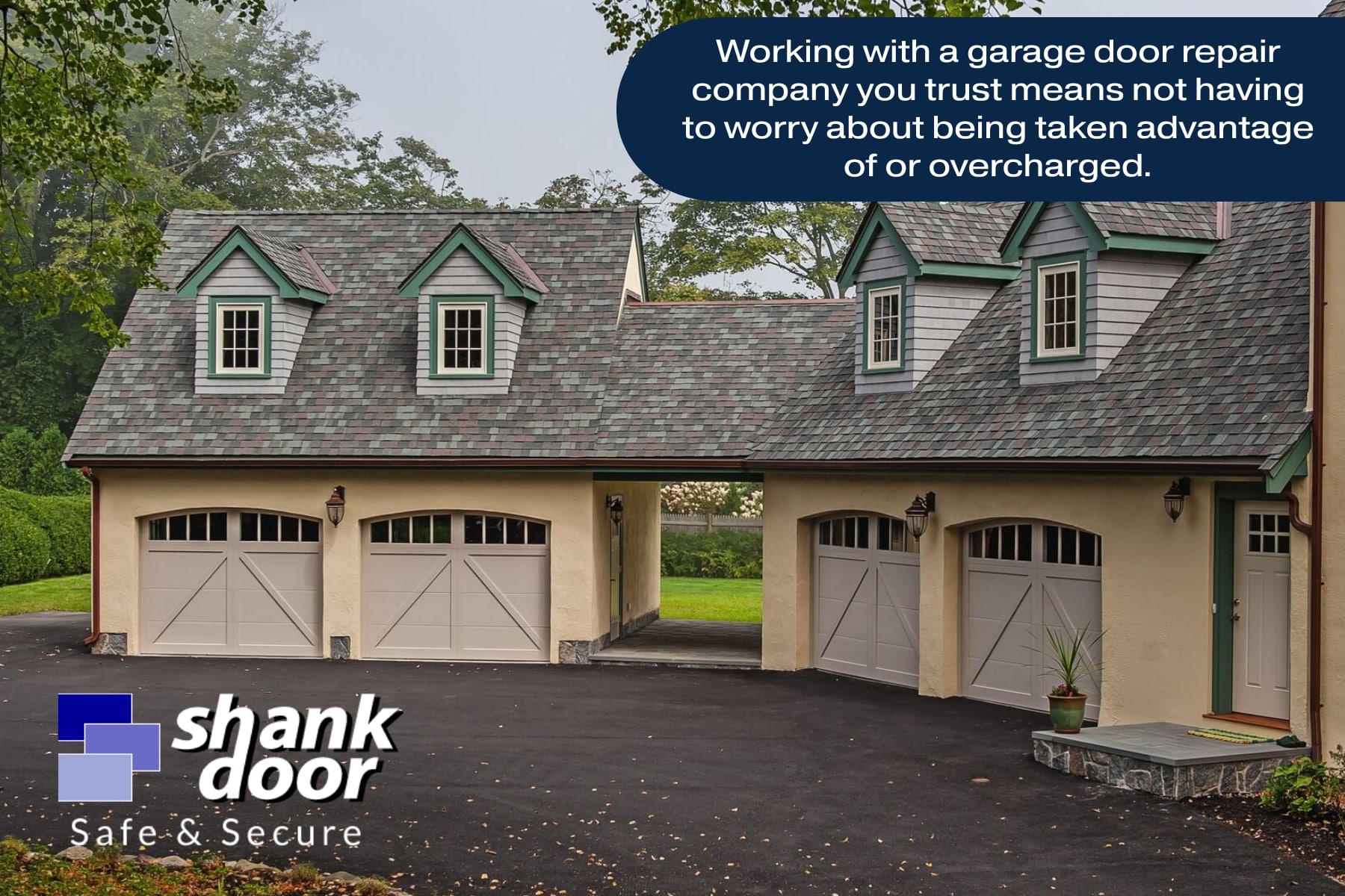 Detached three-car garage with carriage-style garage doors, example of professional garage door installation and quality craftsmanship