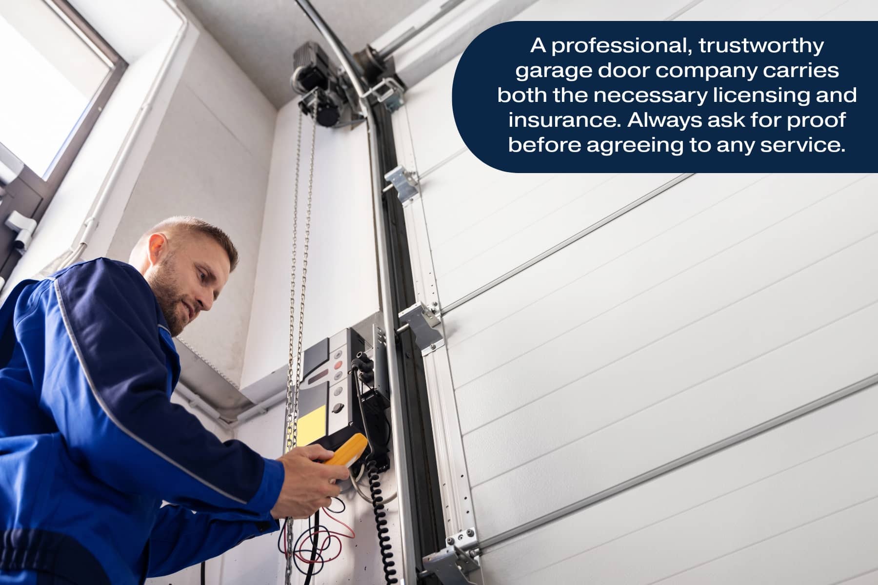 Garage door technician repairing electric garage door opener system, example of professional garage door repair service